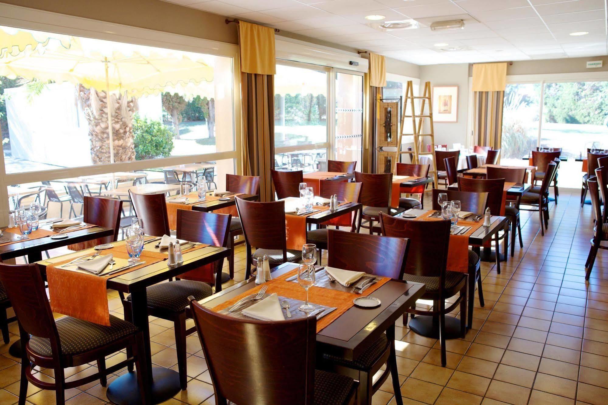 Brit Hotel Marseille Aeroport Mirabeau Restoran fotoğraf